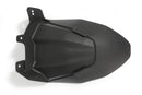 The area around the swing arm pivot, the swing arm, the collector, the gears and the shock absorber are in front of the rear wheel and thus
