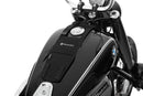 The mounting system is attached to the vehicle with minimal hand pressure and the tank bag can be quickly fastened to it. 