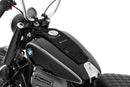 The mounting system is attached to the vehicle with minimal hand pressure and the tank bag can be quickly fastened to it. 