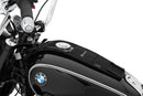 The mounting system is attached to the vehicle with minimal hand pressure and the tank bag can be quickly fastened to it. 