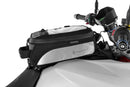 The mounting system is attached to the vehicle with minimal hand pressure and the tank bag can be quickly fastened to it. 