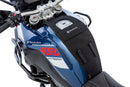 The mounting system is attached to the vehicle with minimal hand pressure and the tank bag can be quickly fastened to it. 