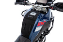 The mounting system is attached to the vehicle with minimal hand pressure and the tank bag can be quickly fastened to it. 
