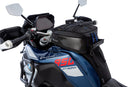 The mounting system is attached to the vehicle with minimal hand pressure and the tank bag can be quickly fastened to it. 