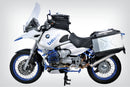 The mounting system is attached to the vehicle with minimal hand pressure and the tank bag can be quickly fastened to it. 