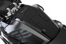 The mounting system is attached to the vehicle with minimal hand pressure and the tank bag can be quickly fastened to it. 