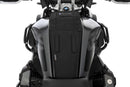 The mounting system is attached to the vehicle with minimal hand pressure and the tank bag can be quickly fastened to it. 