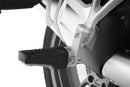 The Wunderlich lowering set will move the footrest down and slightly forward.