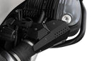 Reliable protection for vulnerable line connections, connectors, the throttle sensor and the injector tube
