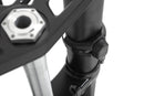 Limit and dampen the steering angle in the event of a fall, even before the standard steering stops are reached with full force