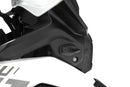 This adapter covers the opening on the original indicator bracket and simultaneously lets you attach accessory indicators.