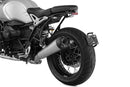 Discretely and lightweight number plate holder which integrates excellent into the sporty line of the Roadster