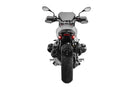 Discretely and lightweight number plate holder which integrates excellent into the sporty line of the Roadster