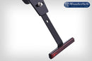 Universal combination of bracket and reflector that can easily be mounted onto virtually any licence plate holder