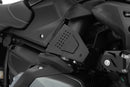 Reliable protection for vulnerable line connections, connectors, the throttle sensor and the injector tube
