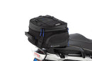 Multifunctional compact bag for the seat or luggage carrier