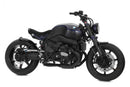 This cover closes the frame triangle on the R nineT and thus covers the air filter box