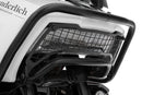 Wunderlich headlight protection grill, foldable, for the Harley-Davidson Pan America 1250 reliably protects the original headlight from...