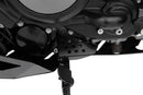 Solid all-round protection for the exposed ignition interruption switch on the side stand.