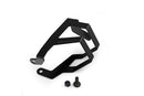 Discreetly integrated protective cover for the front brake fluid reservoir