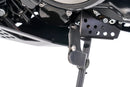 Enlarges the operating area of the side stand and makes it much easier and more ergonomic to fold out.