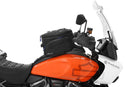 The mounting system is attached to the vehicle with minimal hand pressure and the tank bag can be quickly fastened to it. 